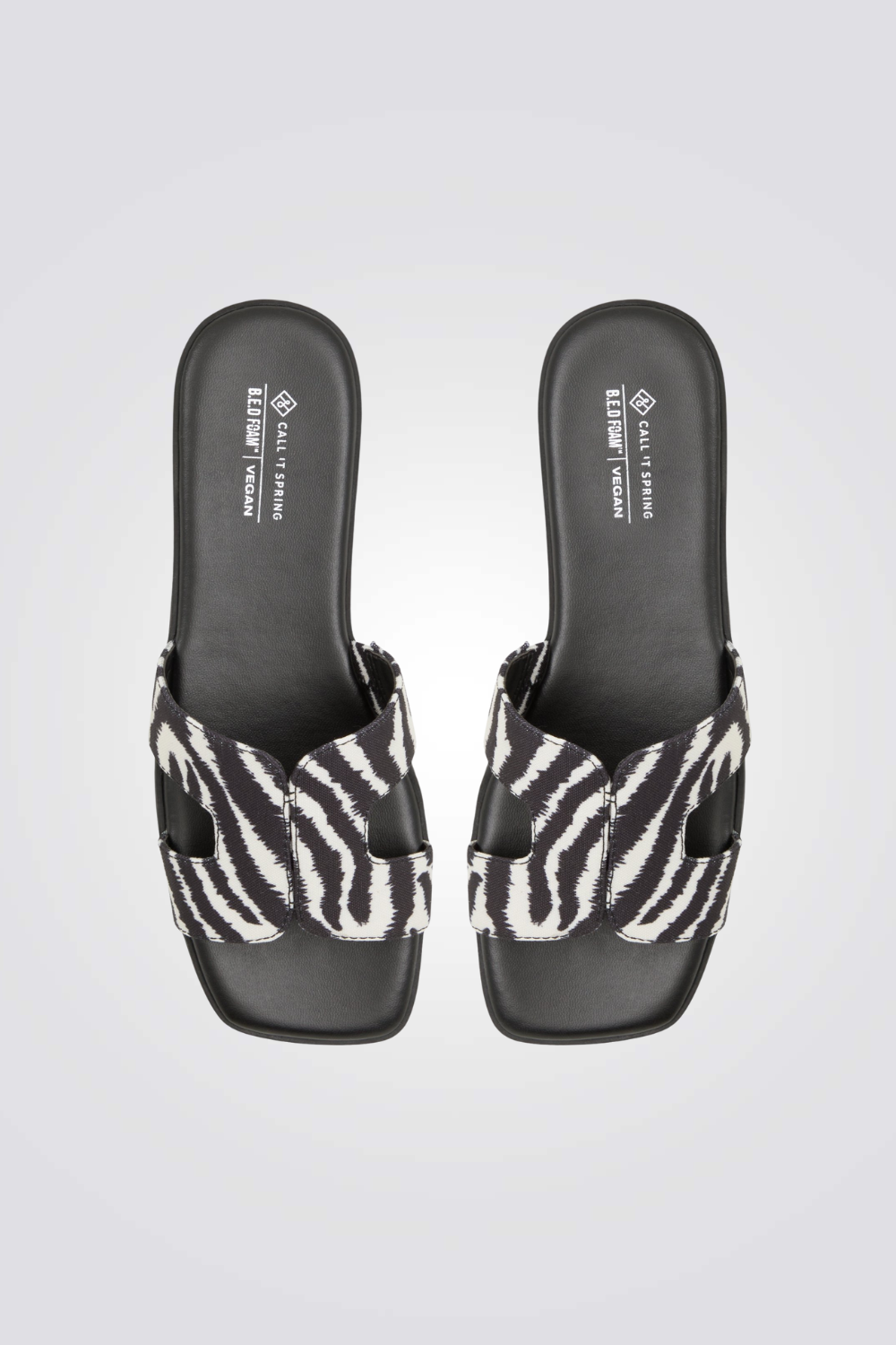 כפכף רצועות בצבע שחור לבן