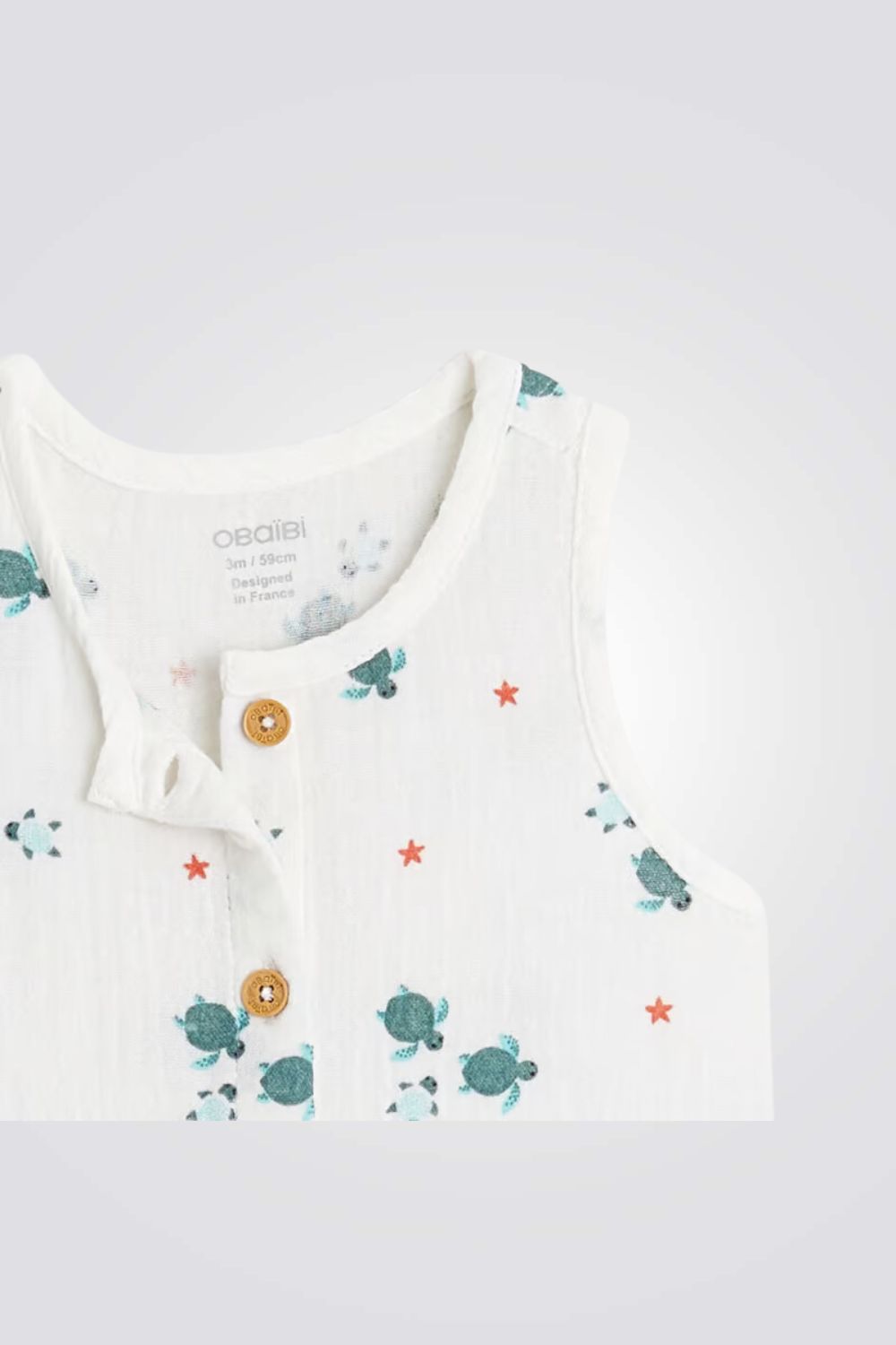 אוברול לבן ללא שרוולים לתינוקות