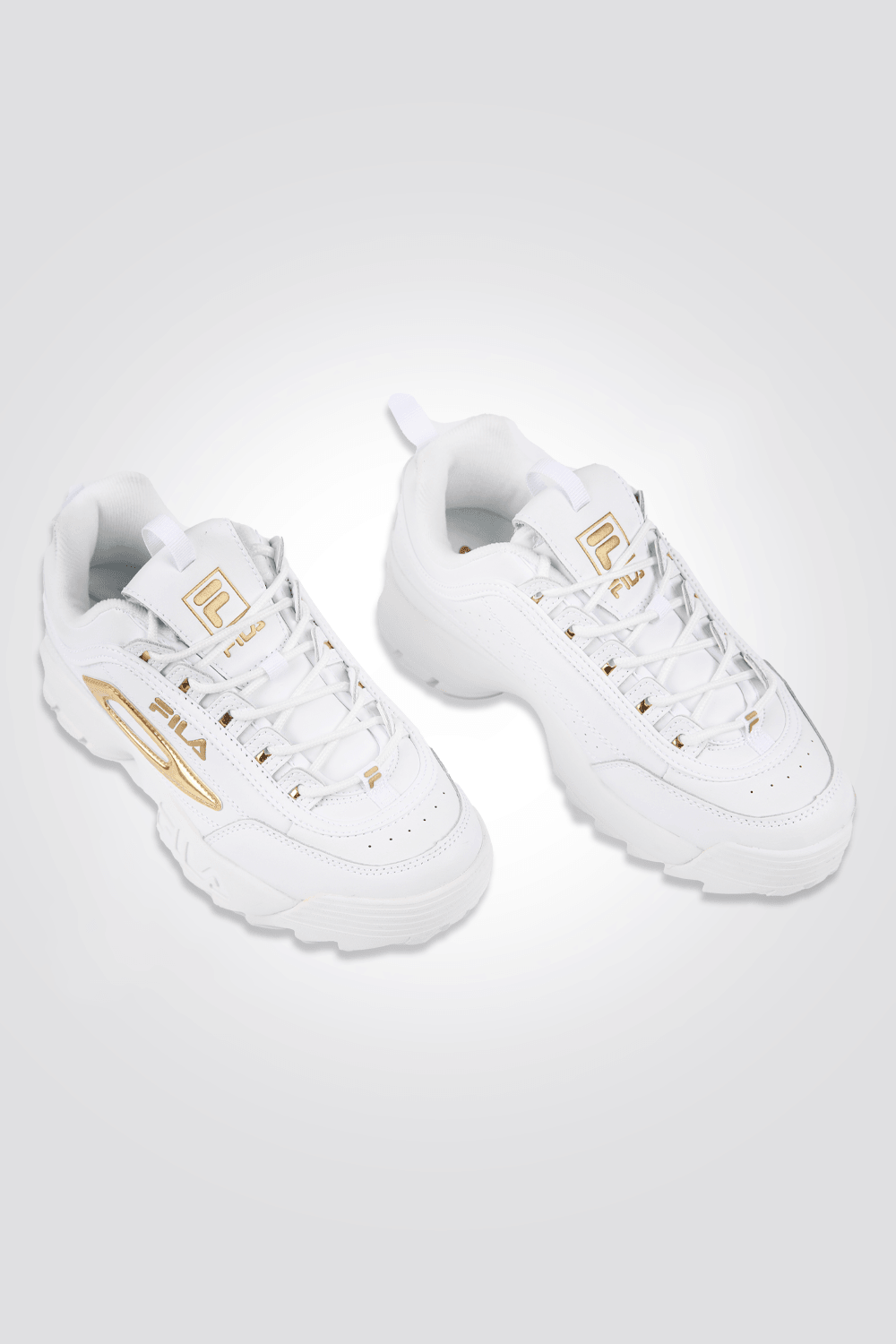 סניקרס לנשים בצבעים לבן וזהב | פילה