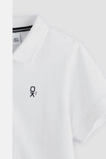 חולצת פולו ילדים לבנה OKAIDI