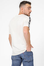 PUMA - טישירט ESS TAPE TEE בצבע שמנת - MASHBIR//365