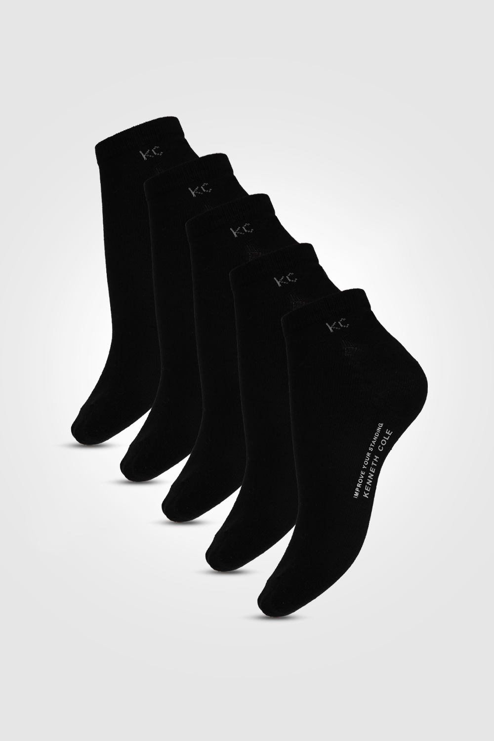 KENNETH COLE - קרסוליות לנשים בצבע שחור ולבן - MASHBIR//365