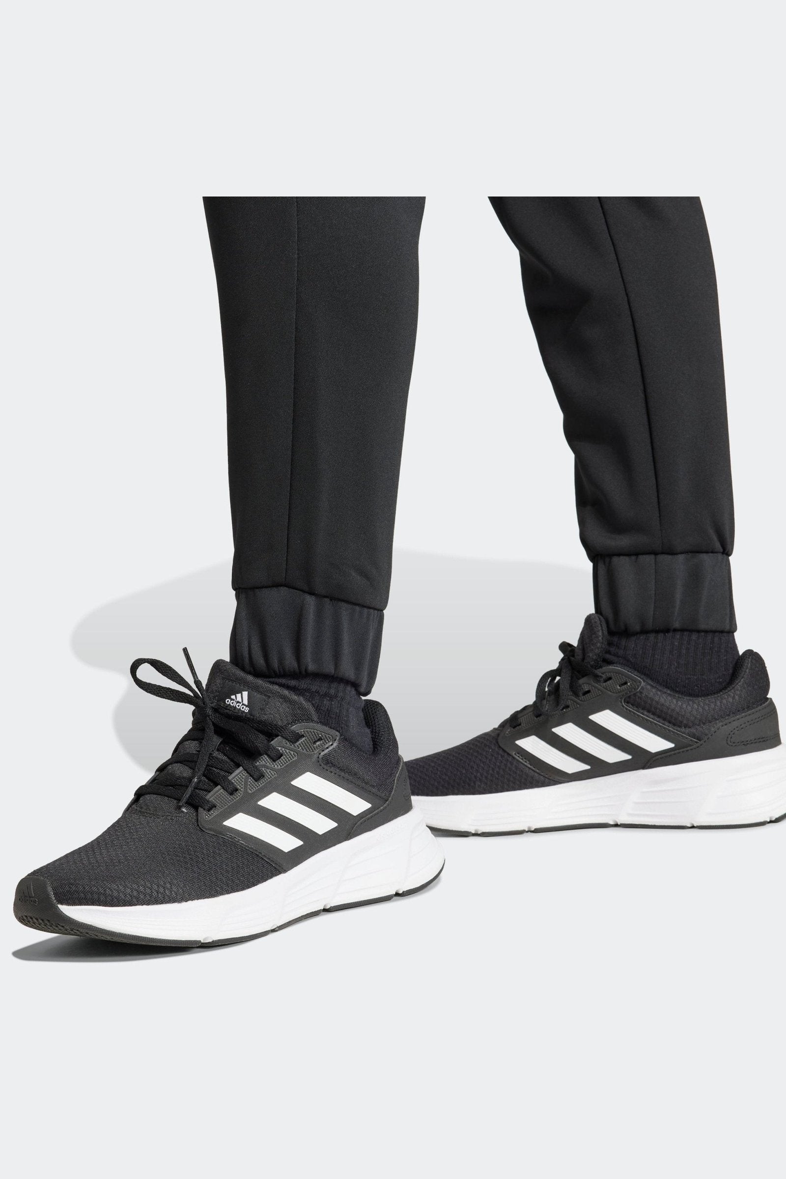 ADIDAS - חליפת אימון לנשים W LINEAR בצבע שחור - MASHBIR//365