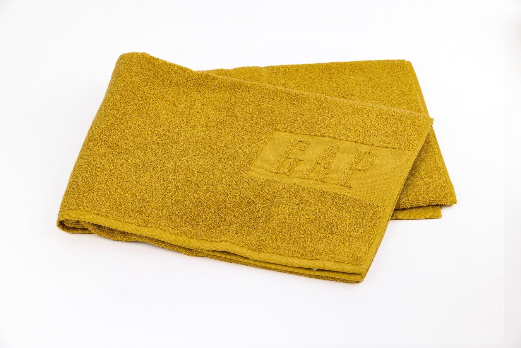 GAP - מגבת פנים כותנה בגוון חרדל - MASHBIR//365