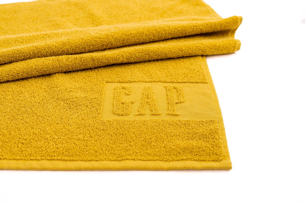 GAP - מגבת גוף כותנה בגוון חרדל - MASHBIR//365