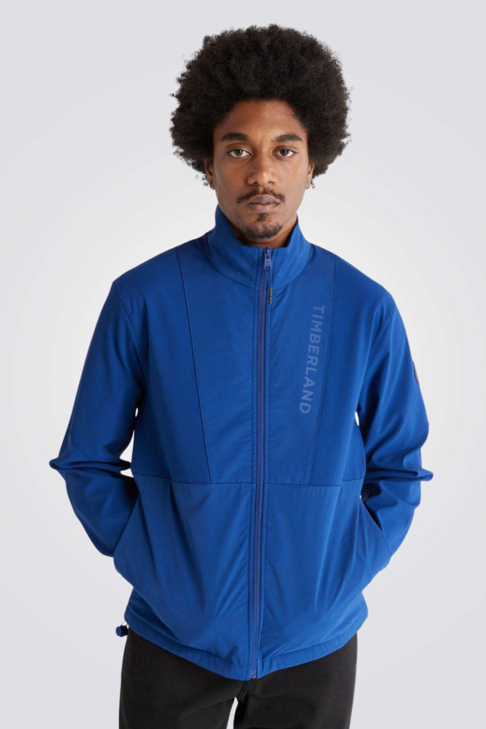 TIMBERLAND - מעיל סופטשל היברידי כחול עם לוגו בחזית - MASHBIR//365