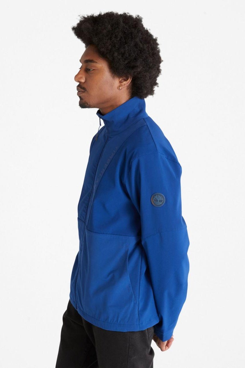TIMBERLAND - מעיל סופטשל היברידי כחול עם לוגו בחזית - MASHBIR//365
