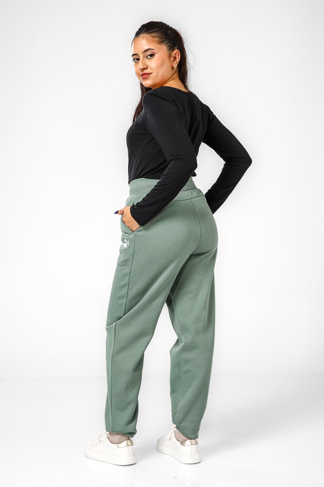 PUMA - מכנס פוטר ארוכים בצבע ירוק לנשים - MASHBIR//365