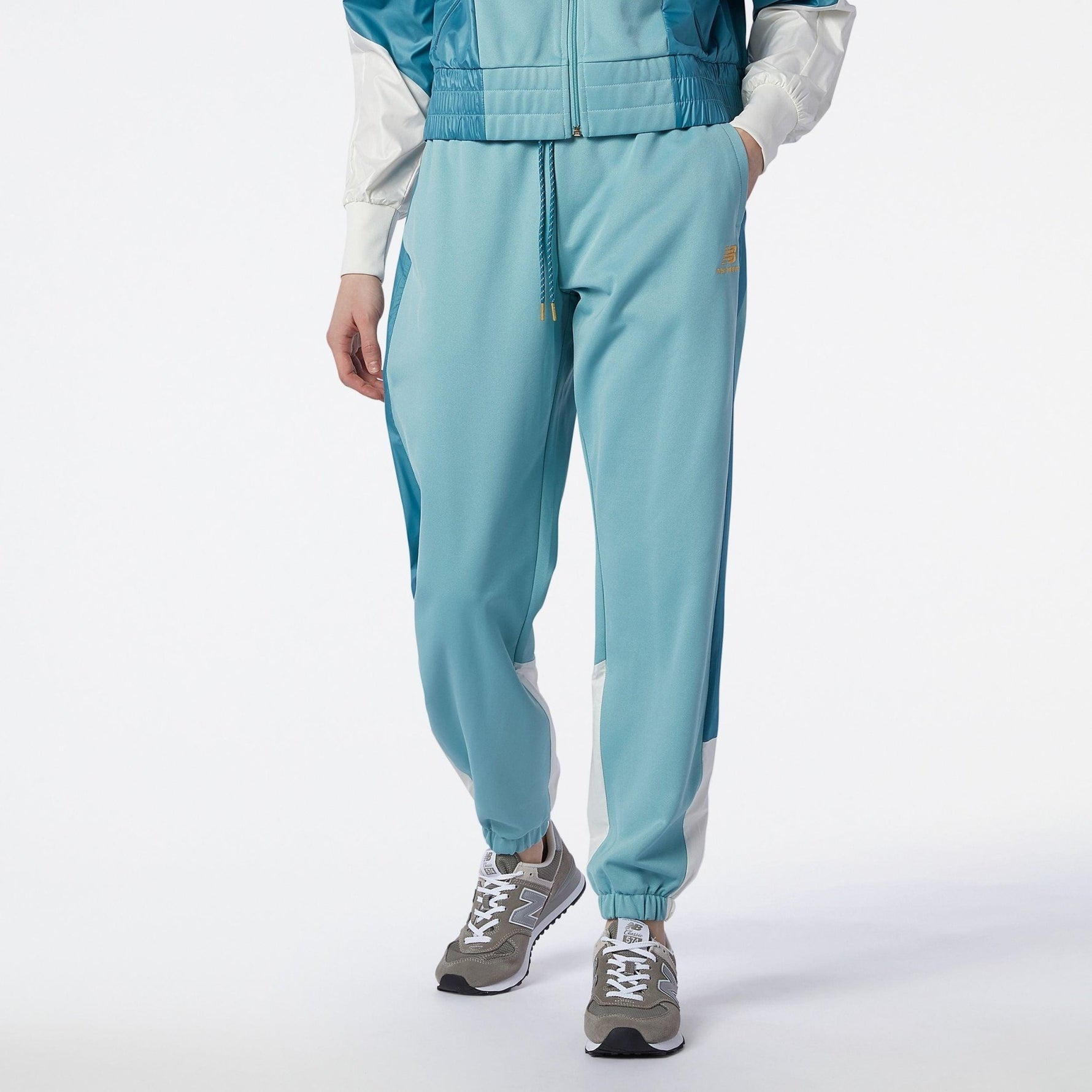 NEW BALANCE - מכנסי Athletics Higher Learning כחולים - MASHBIR//365