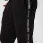 KENNETH COLE - מכנסי טרנינג עם פס כיתוב לוגו בצבע שחור - MASHBIR//365 - 4