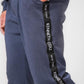 KENNETH COLE - מכנסי טרנינג עם פס כיתוב לוגו בצבע כחול - MASHBIR//365 - 2