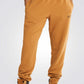 TIMBERLAND - מכנסי טרנינג עם הדפס לוגו צבע חרדל - MASHBIR//365 - 1