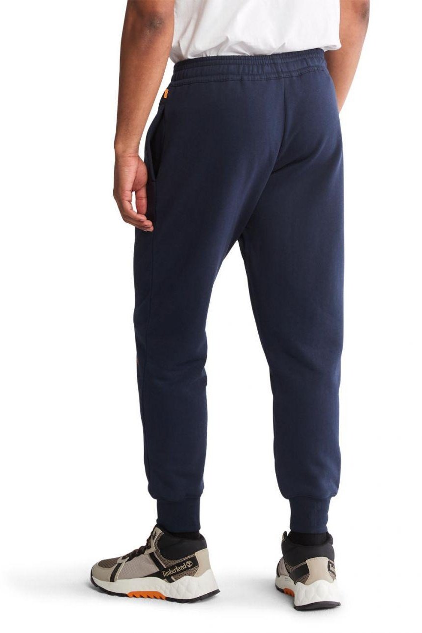 TIMBERLAND - מכנסי טרנינג עם הדפס לוגו המותג על הרגל בתחתית - MASHBIR//365