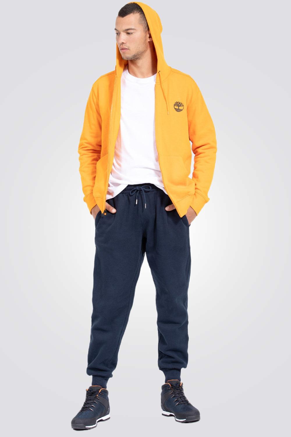 TIMBERLAND - מכנסי טרנינג עם לוגו המותג רקום בצד צבע נייבי - MASHBIR//365