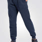 TIMBERLAND - מכנסי טרנינג עם לוגו המותג רקום בצד צבע נייבי - MASHBIR//365 - 1