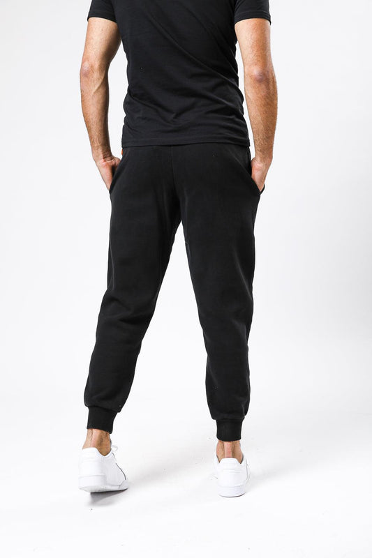 TIMBERLAND - מכנסי טרנינג עם לוגו המותג רקום בצד צבע שחור - MASHBIR//365