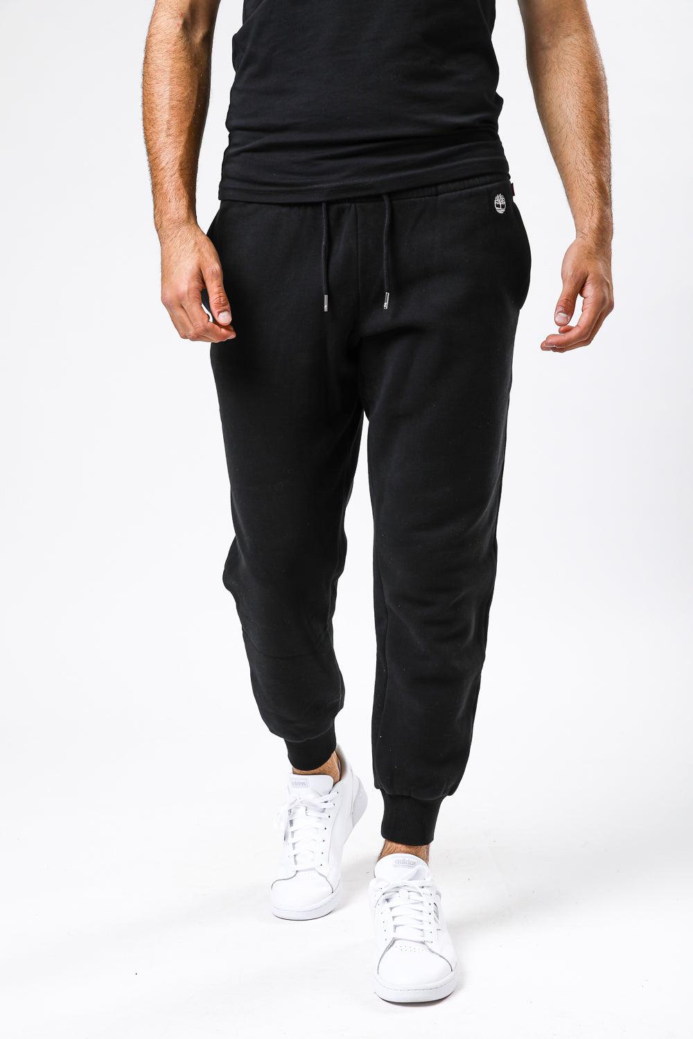 TIMBERLAND - מכנסי טרנינג עם לוגו המותג רקום בצד צבע שחור - MASHBIR//365