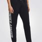 UNDER ARMOUR - מכנסי ספורט ארוכים לנשים בצבע שחור - MASHBIR//365 - 2