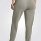 UNDER ARMOUR - מכנסי ספורט ארוכים לנשים בצבע זית - MASHBIR//365 - 3