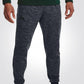 UNDER ARMOUR - מכנסיים ארוכים בצבע אפור - MASHBIR//365 - 1