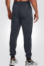 UNDER ARMOUR - מכנסיים ארוכים בצבע אפור - MASHBIR//365