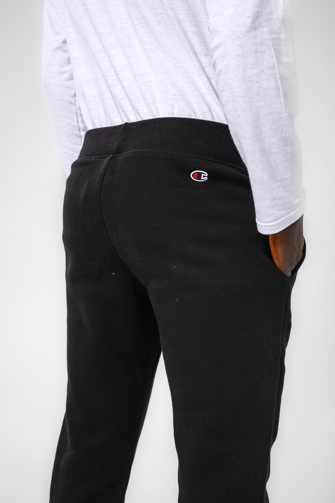 CHAMPION - מכנסיים ארוכים בצבע שחור - MASHBIR//365