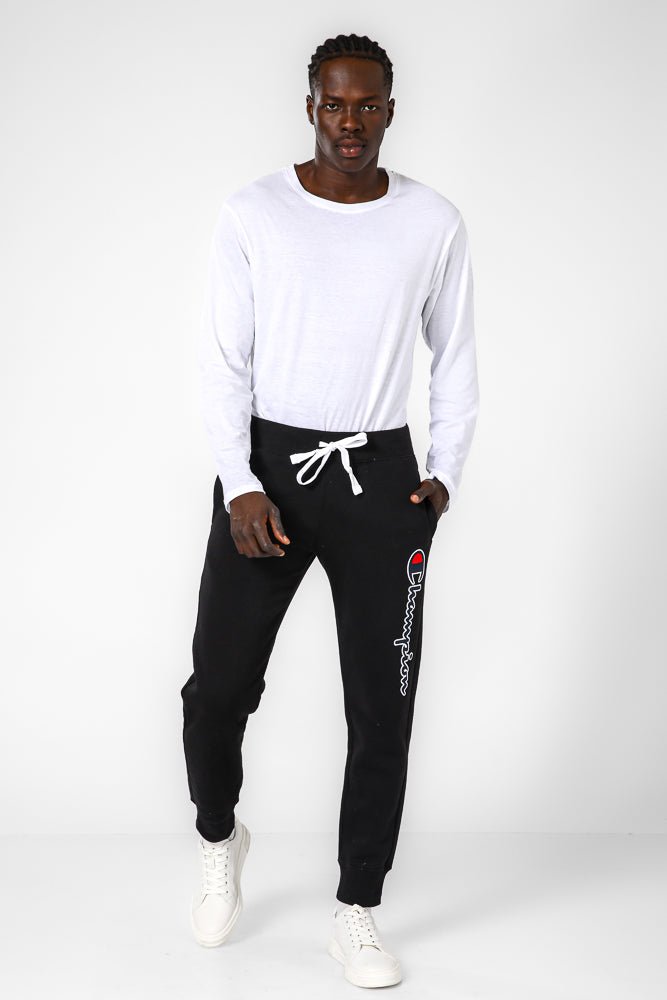 CHAMPION - מכנסיים ארוכים בצבע שחור - MASHBIR//365