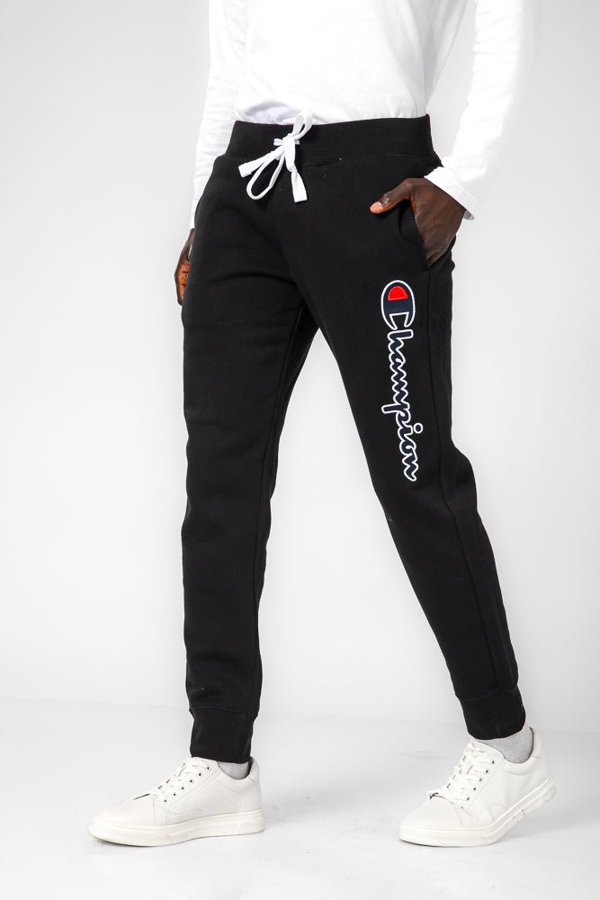 CHAMPION - מכנסיים ארוכים בצבע שחור - MASHBIR//365