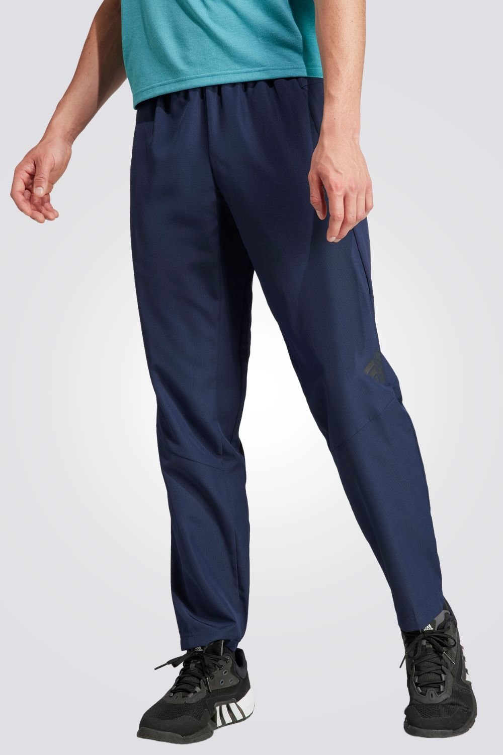 ADIDAS - מכנסיים ארוכים לגברים DESIGNED FOR MOVEMENT בצבע כחול - MASHBIR//365