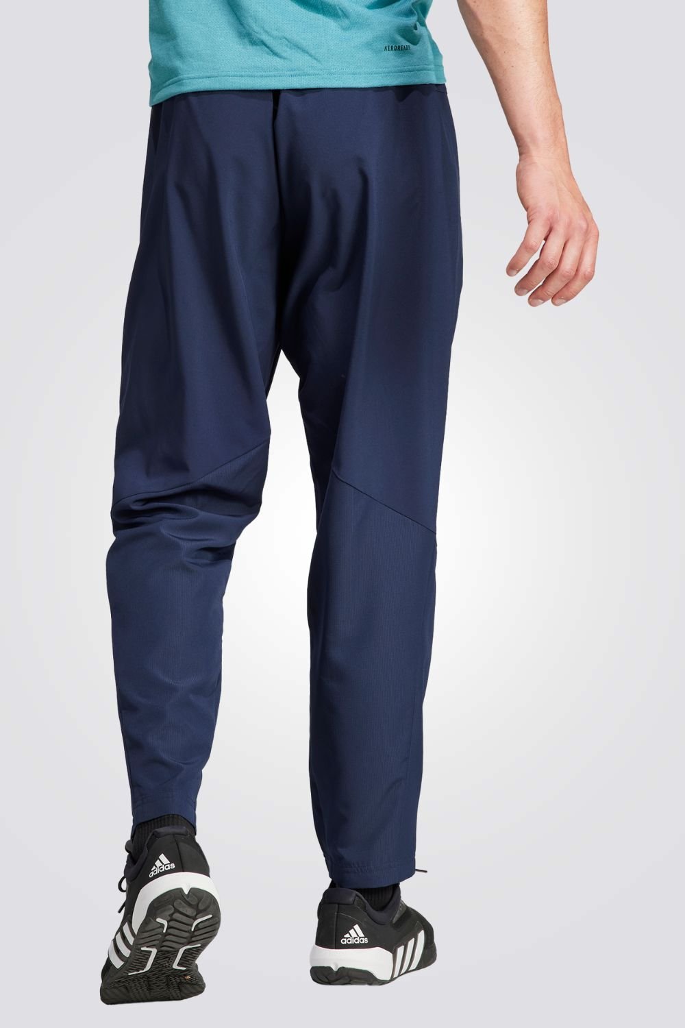 ADIDAS - מכנסיים ארוכים לגברים DESIGNED FOR MOVEMENT בצבע כחול - MASHBIR//365