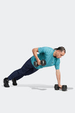 ADIDAS - מכנסיים ארוכים לגברים DESIGNED FOR MOVEMENT בצבע כחול - MASHBIR//365