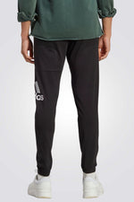 ADIDAS - מכנסיים ארוכים לגברים ESSENTIALS SINGLE JERSEY בצבע שחור - MASHBIR//365
