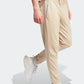 ADIDAS - מכנסיים ארוכים לגברים ESSENTIALS SINGLE JERSEY TAPERED בצבע בז' - MASHBIR//365 - 5