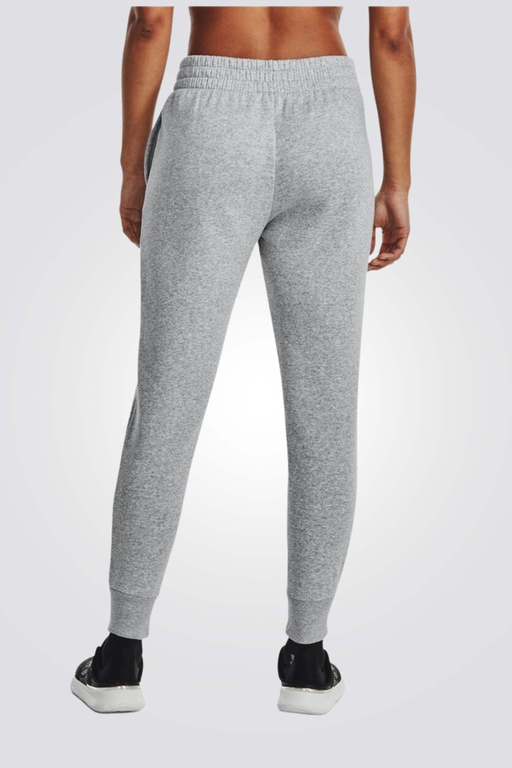 UNDER ARMOUR - מכנסיים ארוכים לנשים בצבע אפור - MASHBIR//365