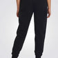 UNDER ARMOUR - מכנסיים ארוכים לנשים בצבע שחור - MASHBIR//365 - 3