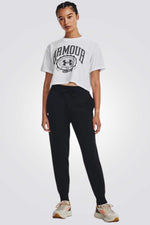 UNDER ARMOUR - מכנסיים ארוכים לנשים בצבע שחור - MASHBIR//365