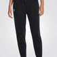UNDER ARMOUR - מכנסיים ארוכים לנשים בצבע שחור - MASHBIR//365 - 1