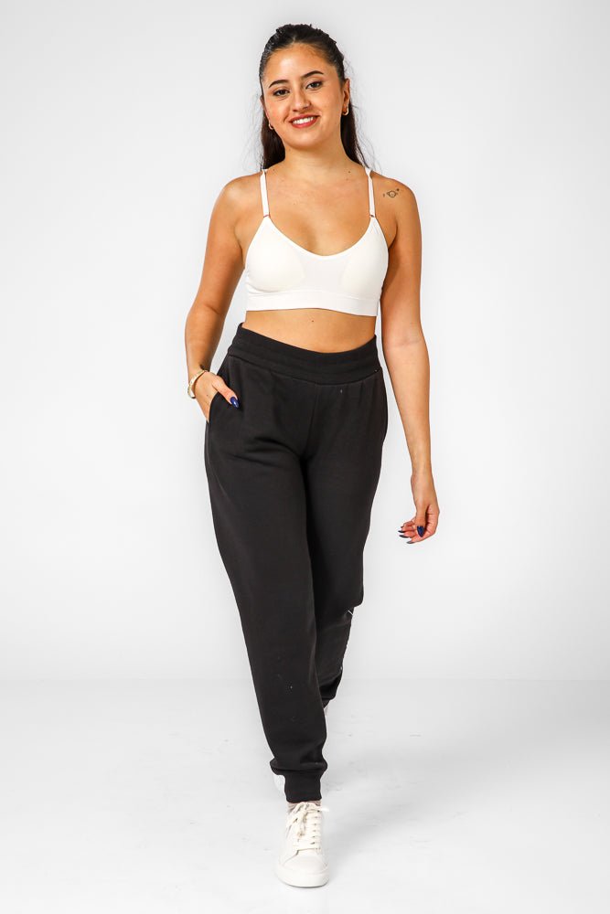 PUMA - מכנסיים ארוכים לנשים ESS בצבע שחור - MASHBIR//365