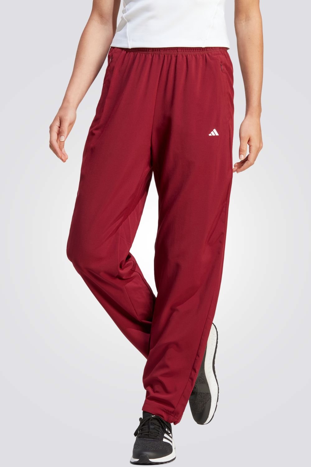 ADIDAS - מכנסיים ארוכים לנשים TRN בצבע אדום - MASHBIR//365