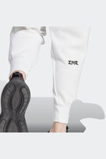 ADIDAS - מכנסיים ארוכים לנשים Z.N.E בצבע לבן - MASHBIR//365