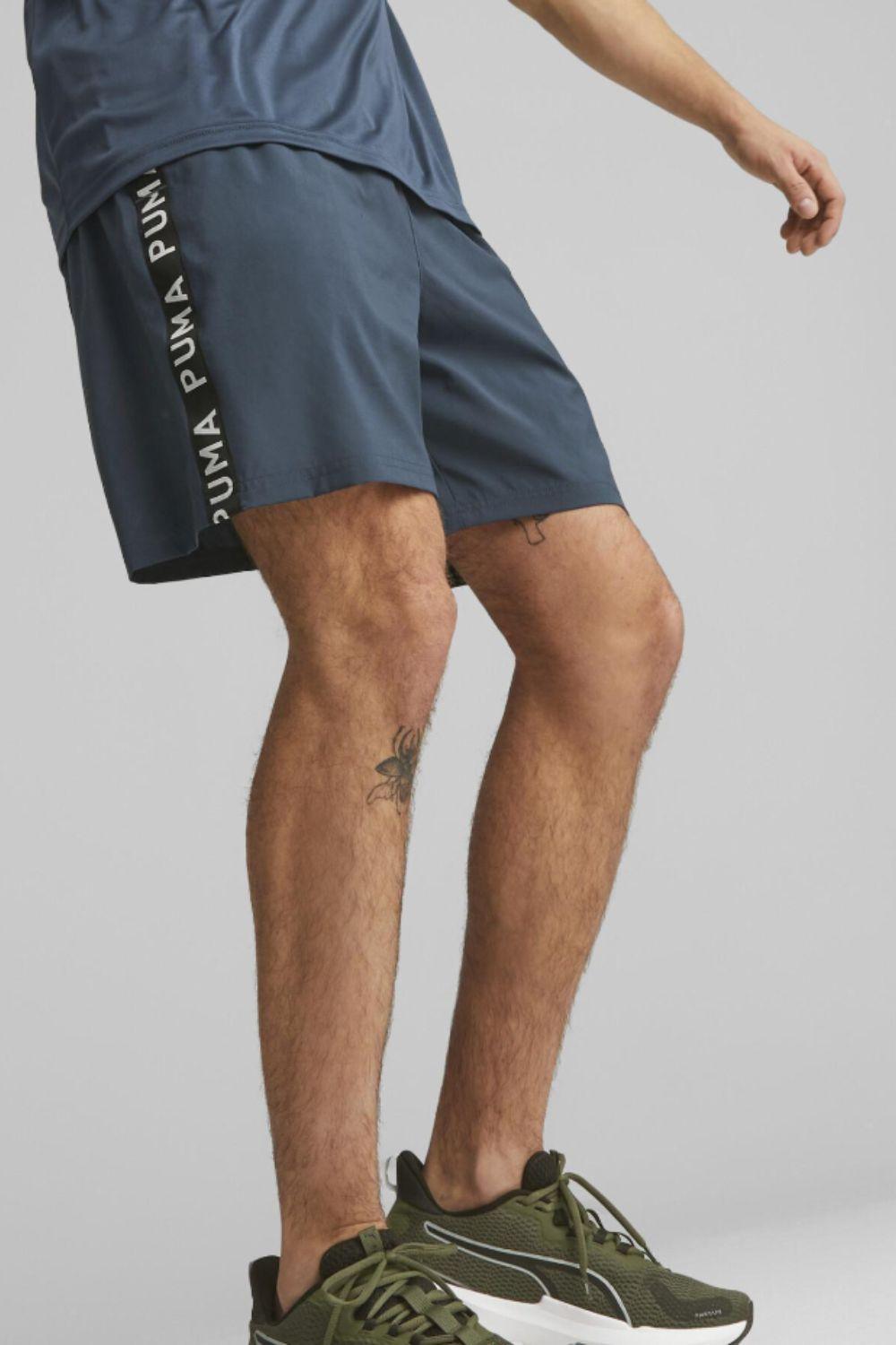 PUMA - מכנסיים קצרים לגבר ribbon Puma 7" בצבע כחול - MASHBIR//365