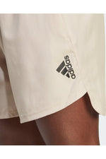 ADIDAS - מכנסיים קצרים לגברים DESIGNED FOR MOVEMENT בצבע בז' - MASHBIR//365