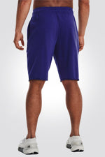 UNDER ARMOUR - מכנסיים קצרים RIVAL TERRY לגבר בצבע כחול - MASHBIR//365