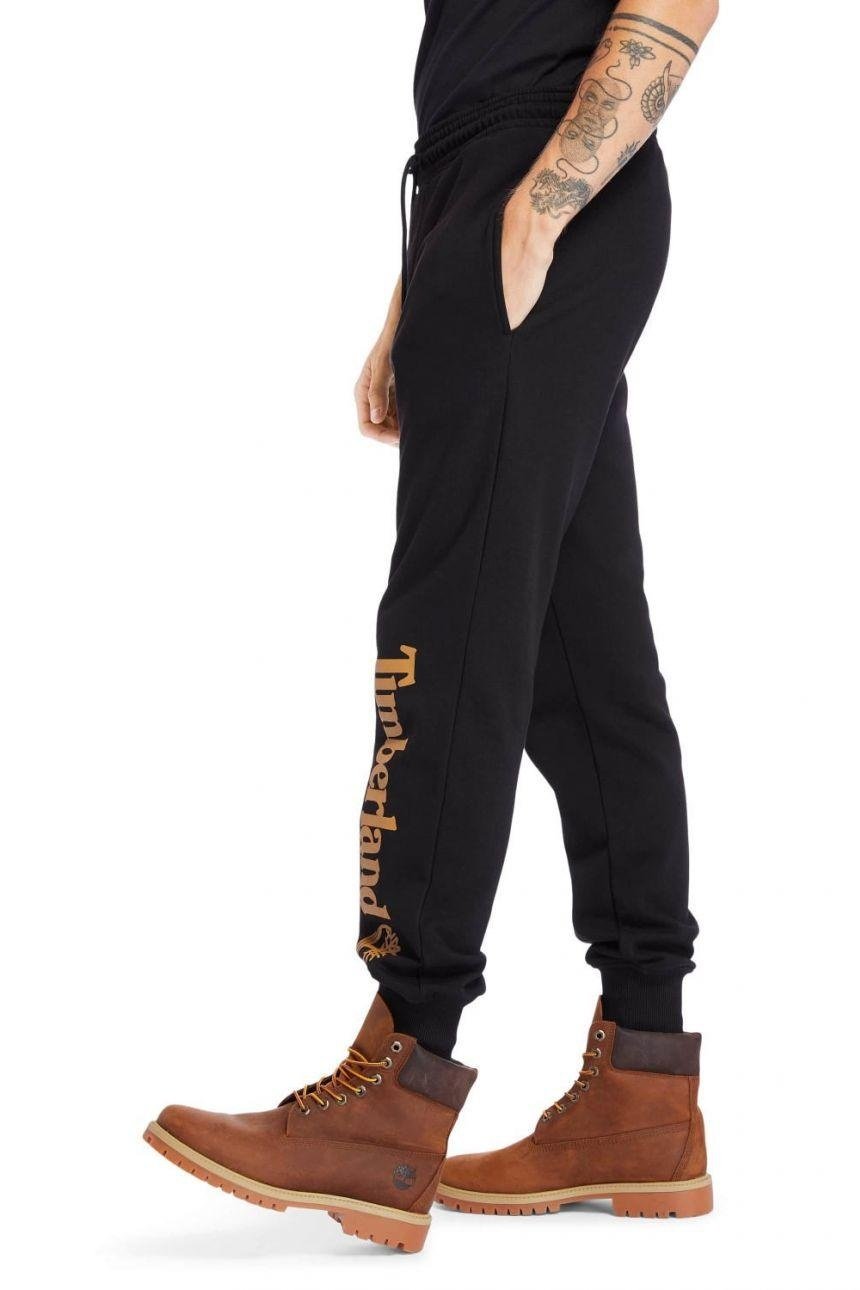 TIMBERLAND - טרנינג שחור עם הדפס לוגו על הרגל - MASHBIR//365