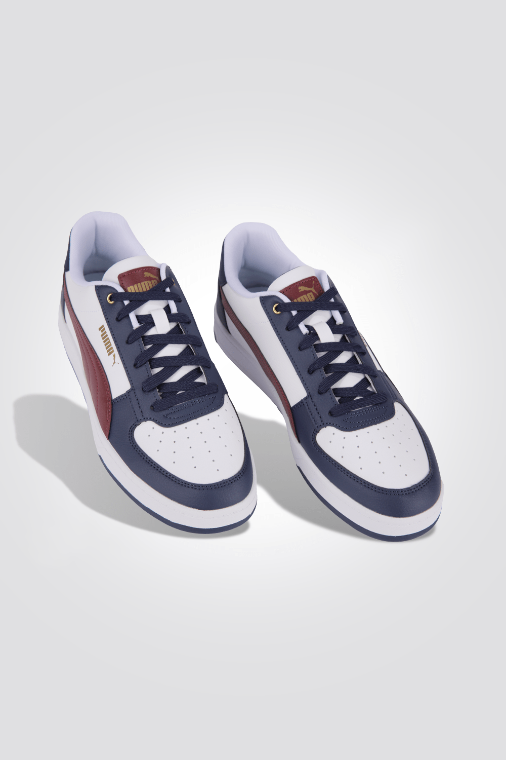 PUMA - סניקרס לגברים Caven בצבע נייבי ולבן - MASHBIR//365