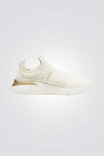 PUMA - סניקרס לנשים Softride Pro Echo Sl בצבע לבן וזהב - MASHBIR//365