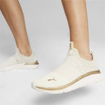 PUMA - סניקרס לנשים Softride Pro Echo Sl בצבע לבן וזהב - MASHBIR//365