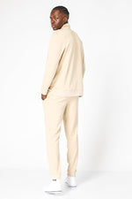 DELTA - סוויטשירט עם רוכסן מבד דק בצבע בז' - MASHBIR//365