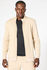 DELTA - סוויטשירט עם רוכסן מבד דק בצבע בז' - MASHBIR//365