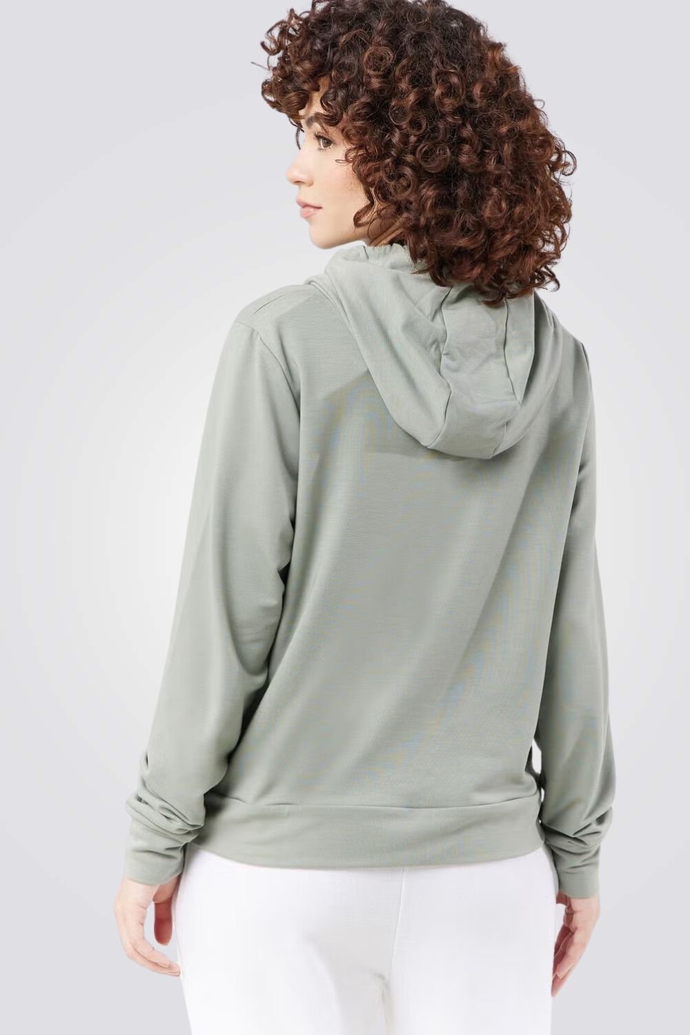 UNDER ARMOUR - סווטשירט קפוצ'ון לנשים בצבע ירוק - MASHBIR//365